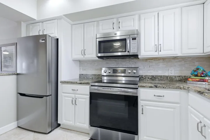 Kitchen showing new fridge