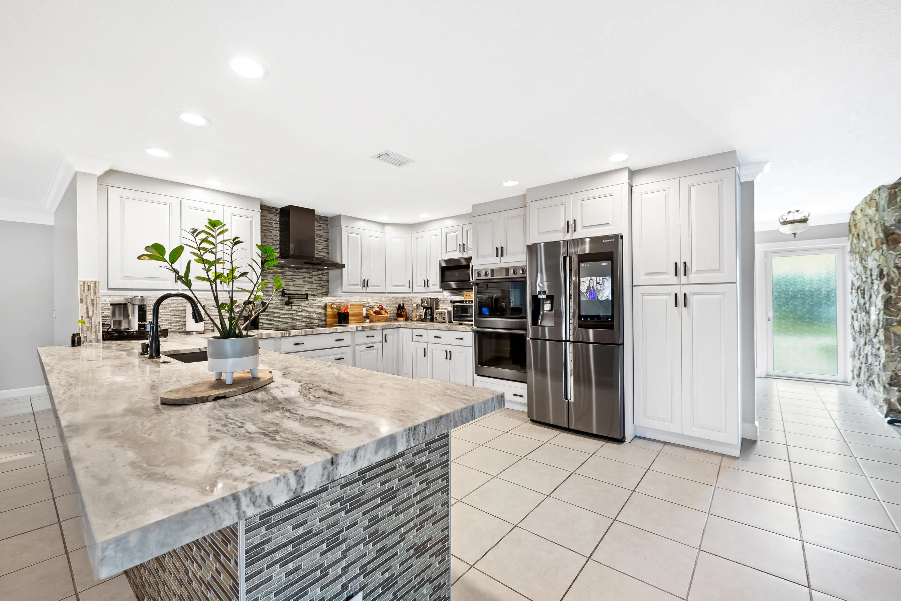 Kitchen with view to impact front door
