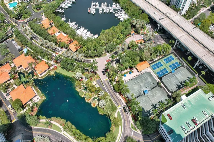 Country club living at its best with tennis courts, pickleball courts, basketball court, Marina, restaurant, beauty salon and dog​​‌​​​​‌​​‌‌​‌‌​​​‌‌​‌​‌​‌​​​‌​​ park.