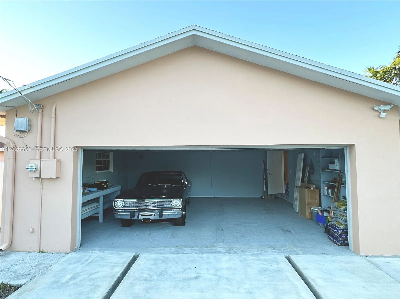 Very nice backyard with a 2 car garage and driveway