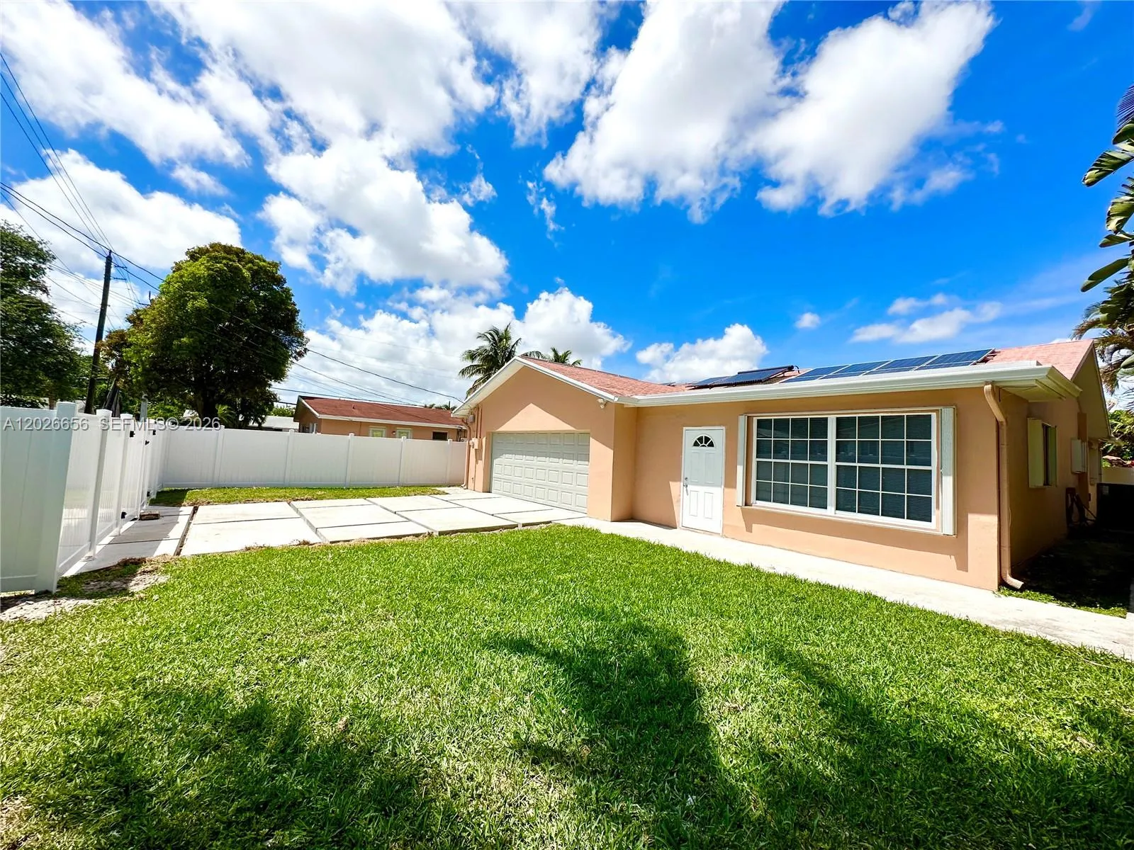 Very nice backyard with a 2 car garage and driveway
