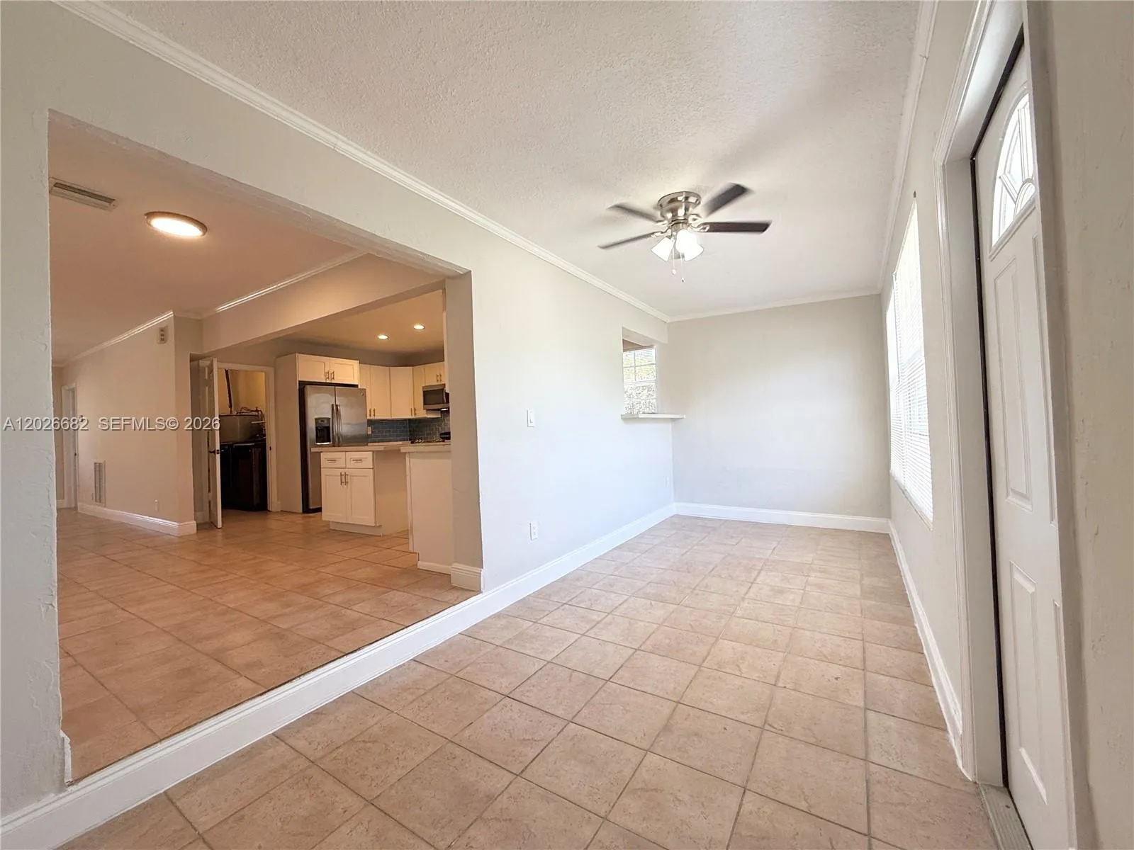 Florida room that can be used as a office or TV room.