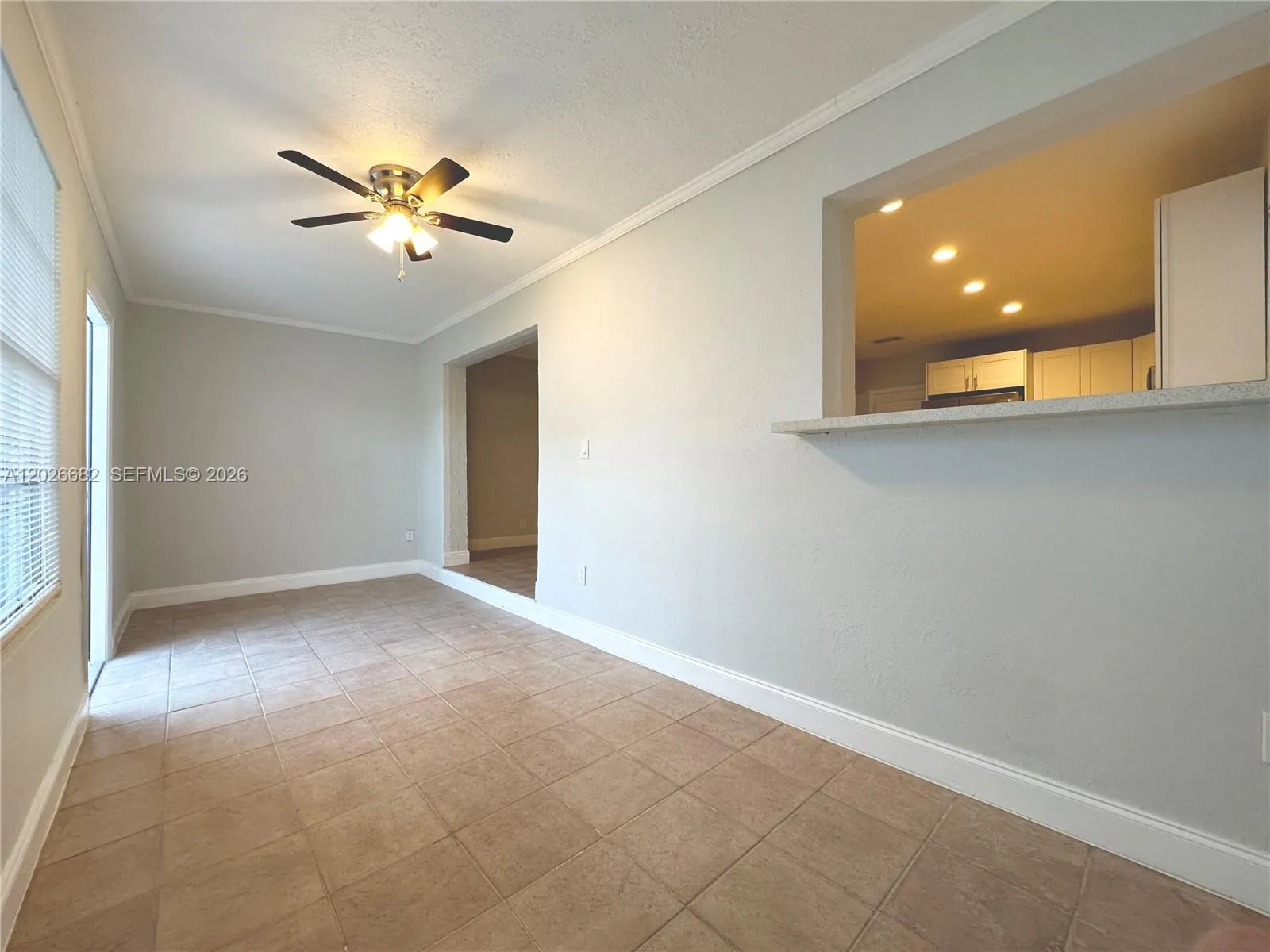 Florida room that can be used as a office or TV room.