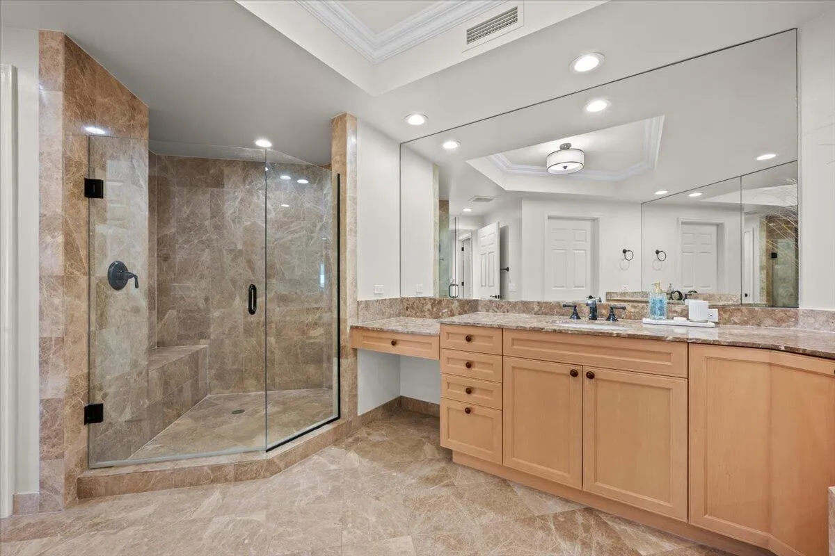 Spa-like primary bathroom with separate shower and tub