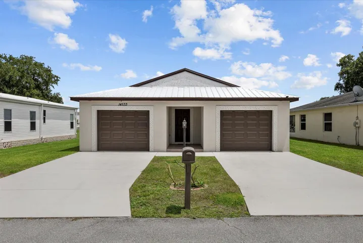 Garage on the right is for a golf cart