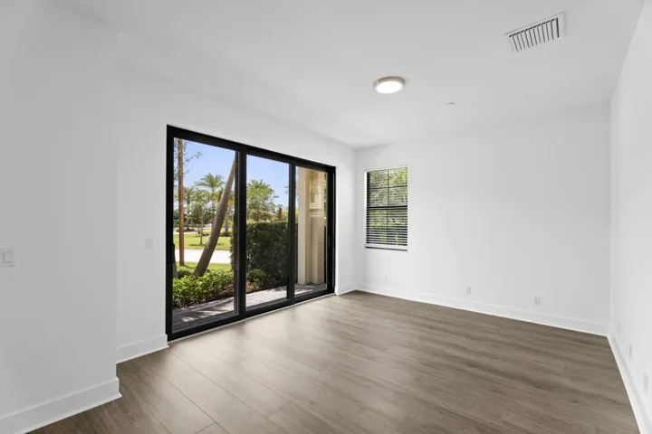 First Floor Den/Flex Room with Gorgeous Wood Floors, First Floor Full Bathroom & Under The Stairs Storage