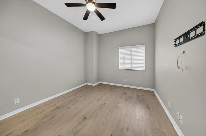 Wood floors in guest bedroom