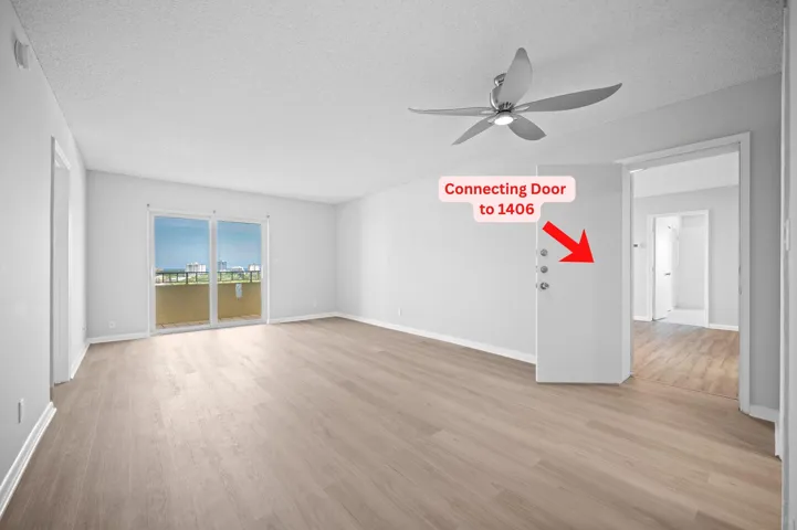 Unit 1407 adjoining door to 1406 and the balcony doors.