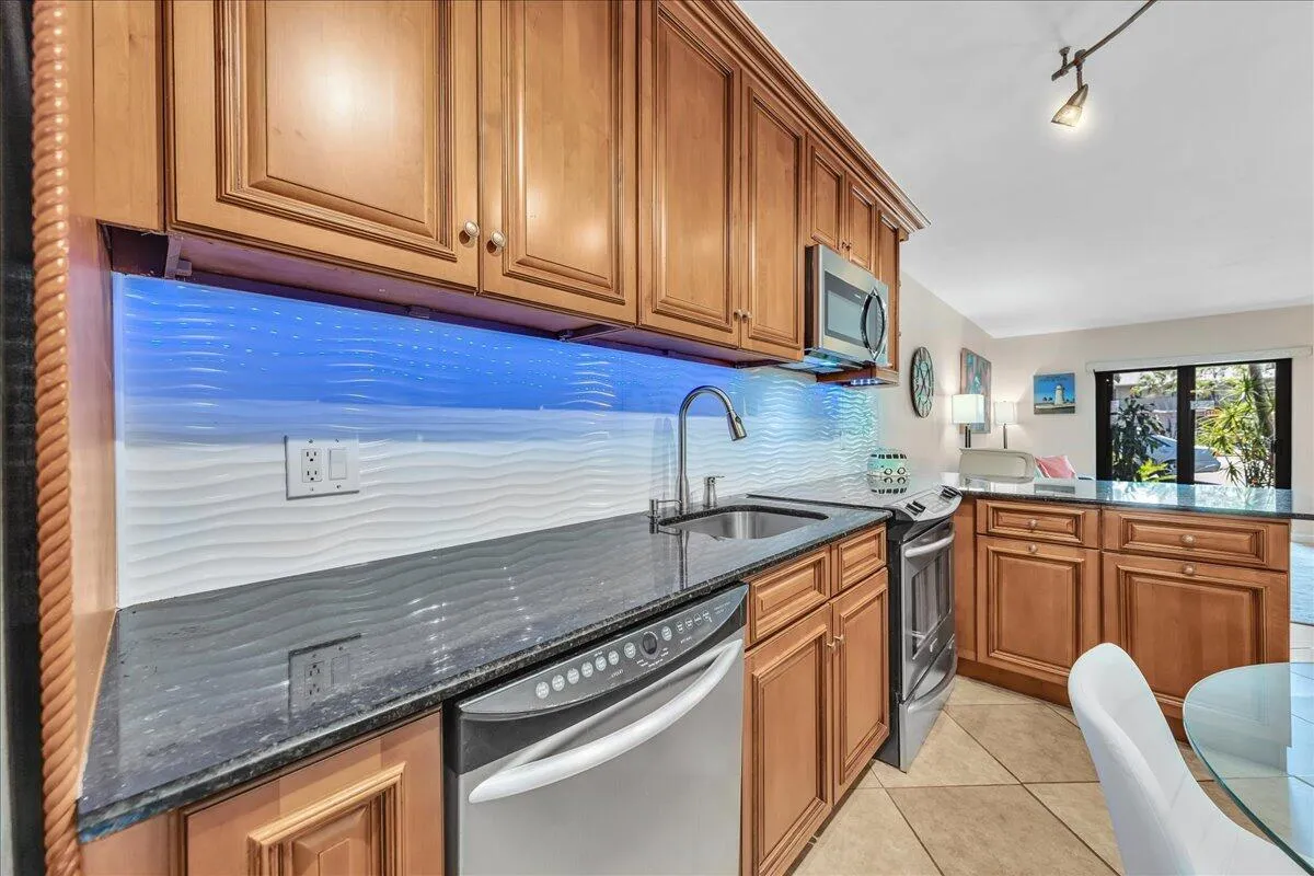 Granite counters and tile backsplash
