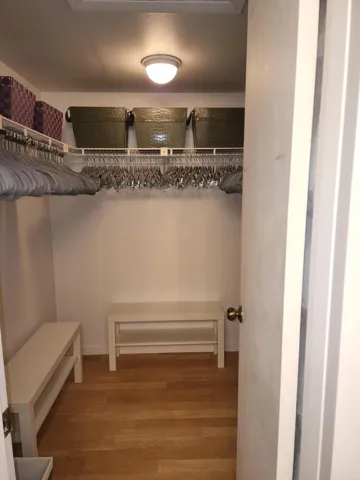 Primary bedroom walkin closet