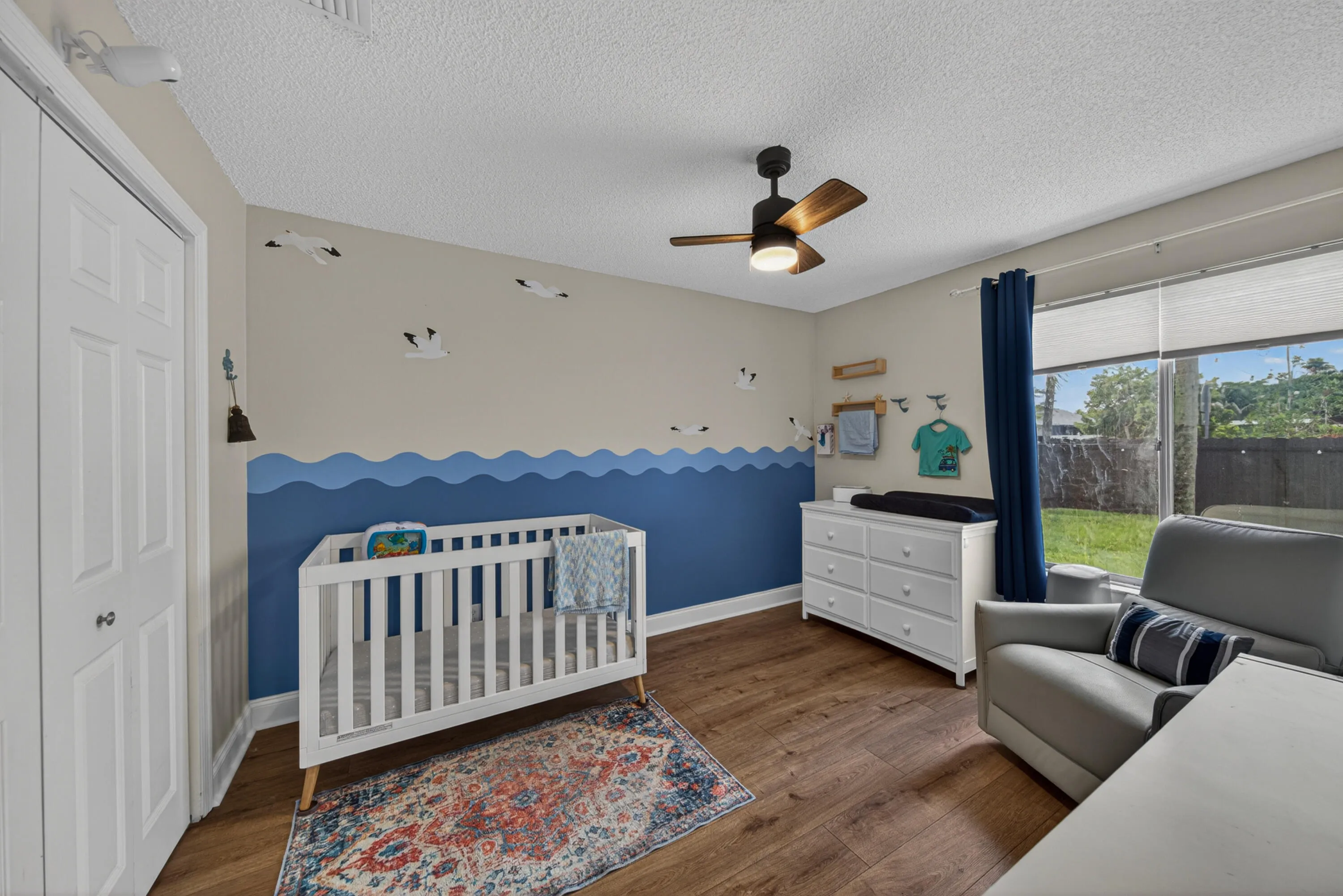 3rd bedroom currently being used as nursery with backyard access