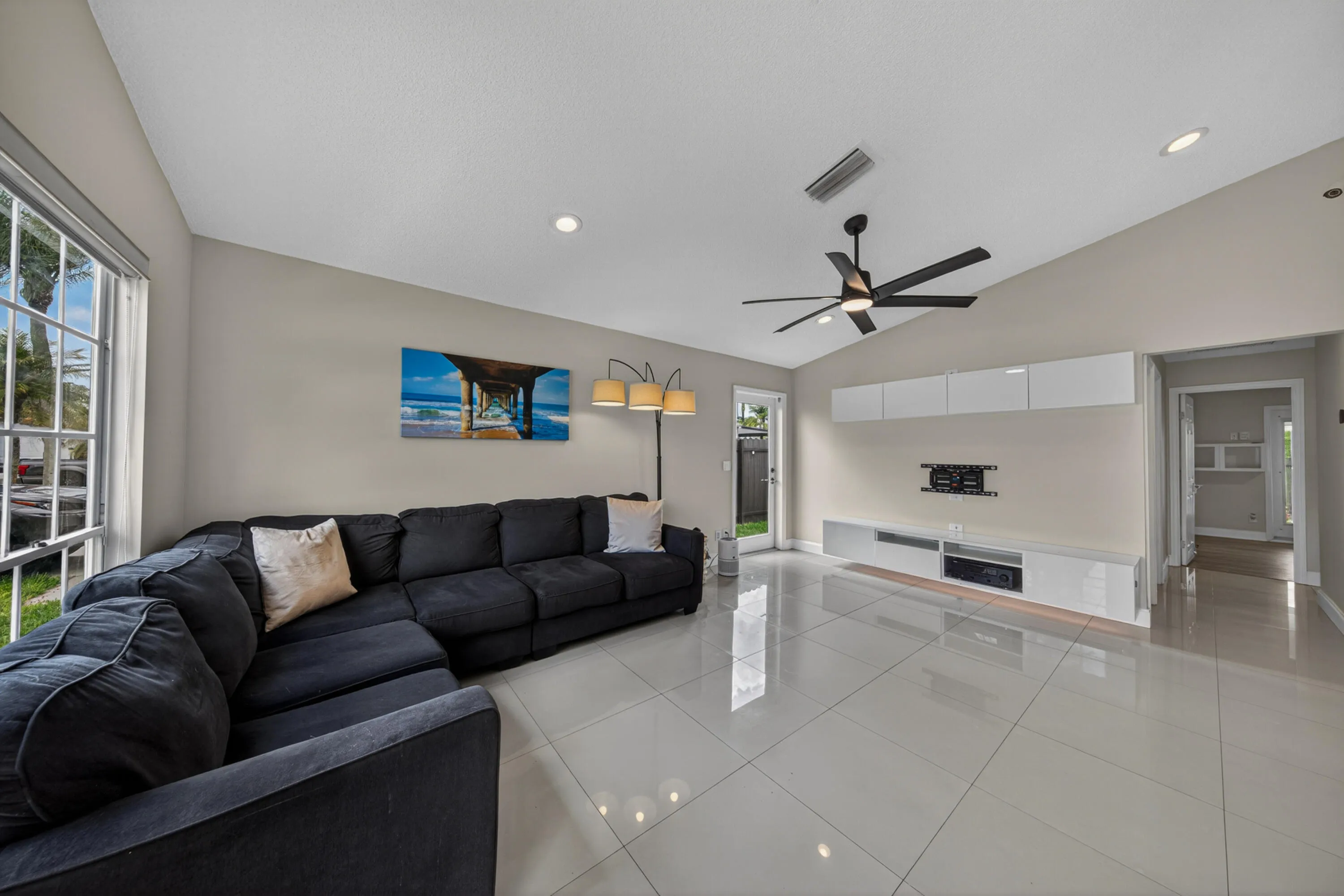 spacious family room with updated tile