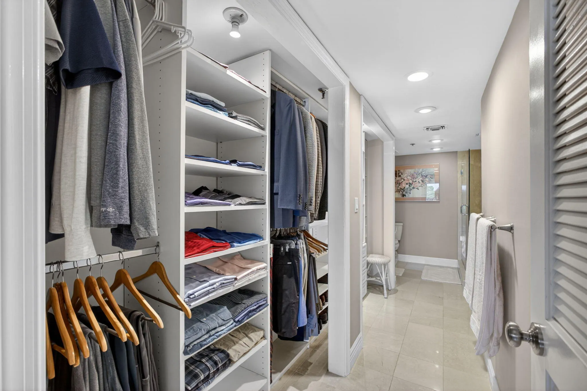 Primary Closet into Bathroom