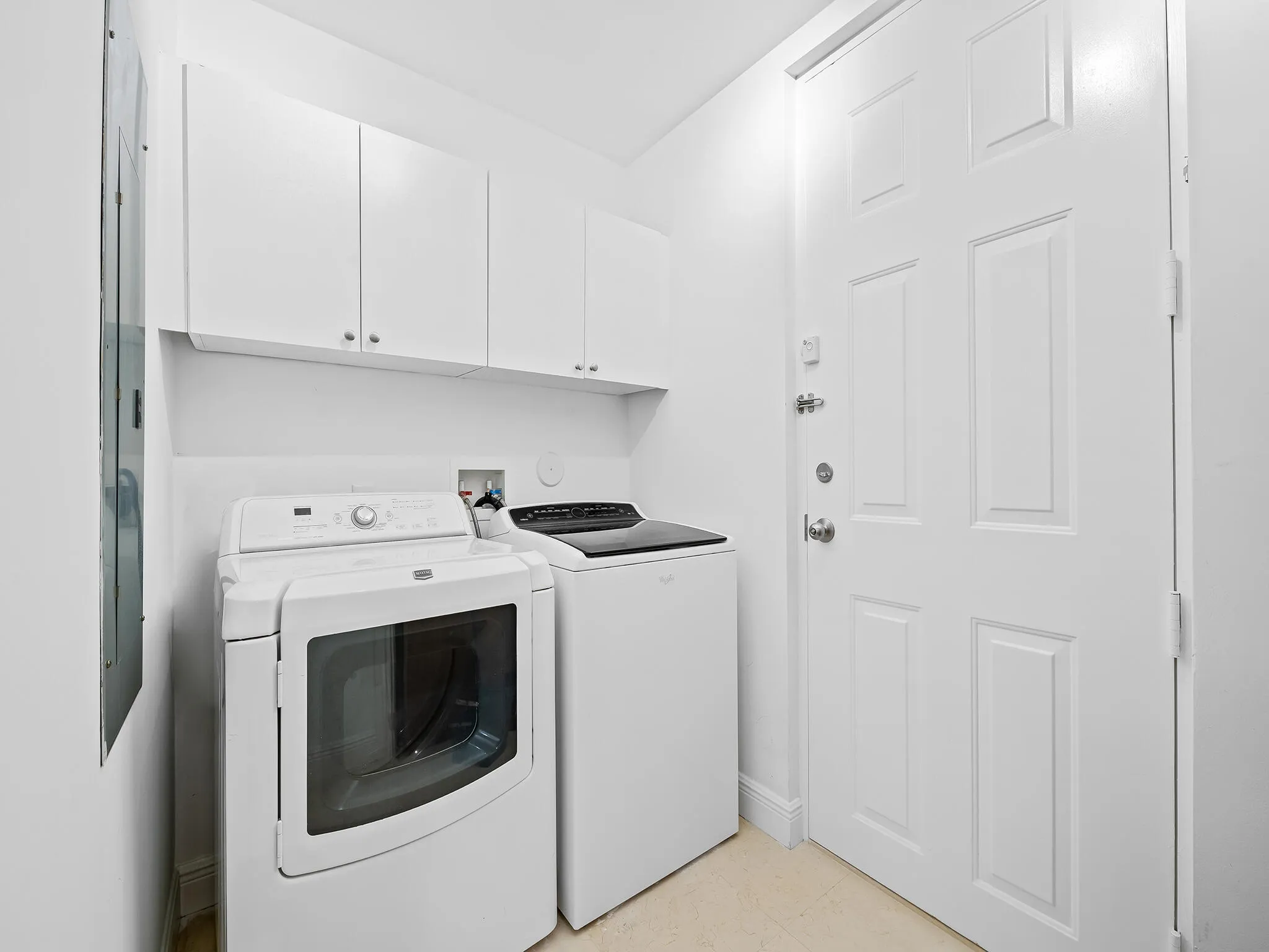 Separate laundry room.