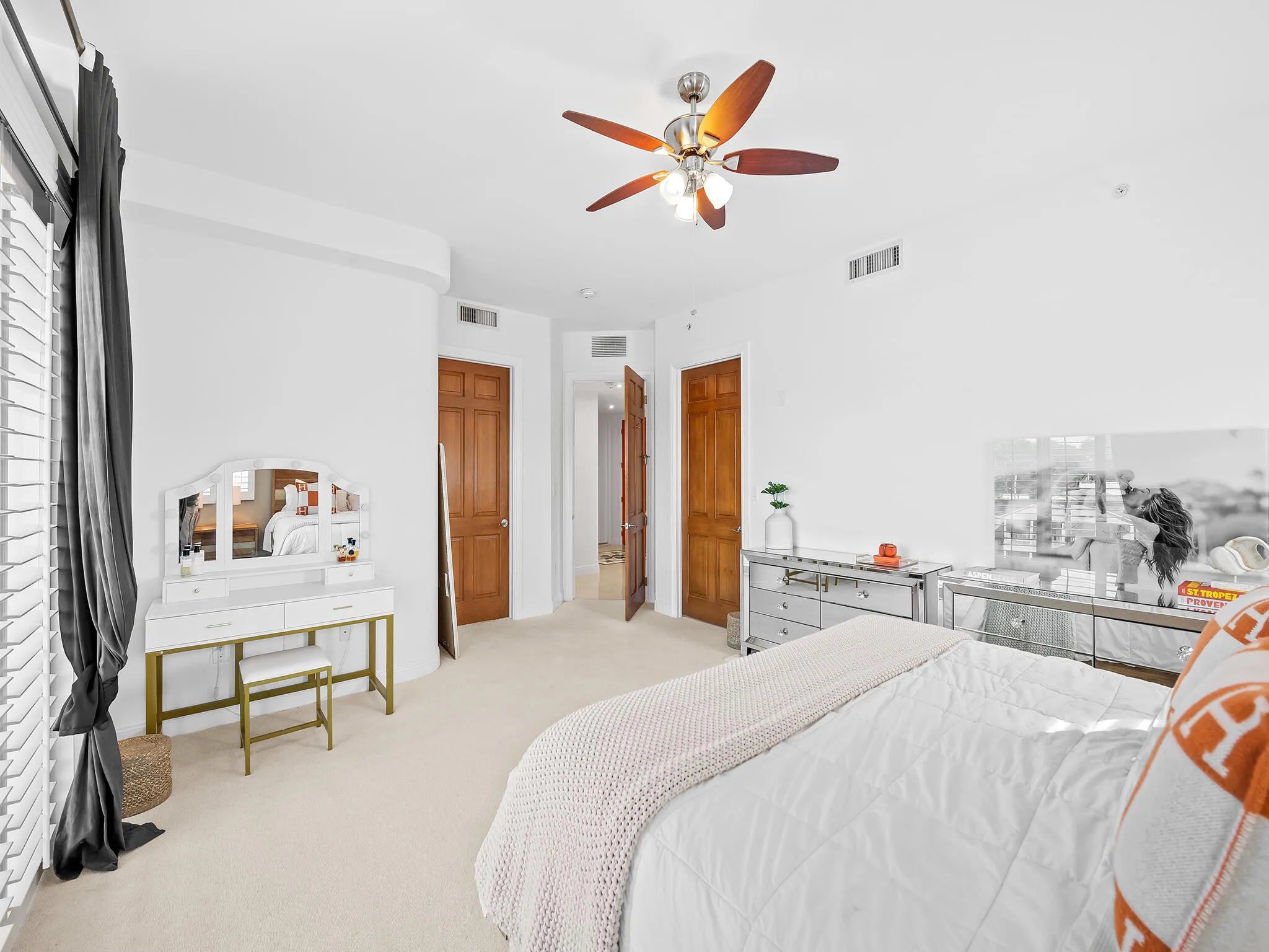 Primary suite features a walk-in closet.