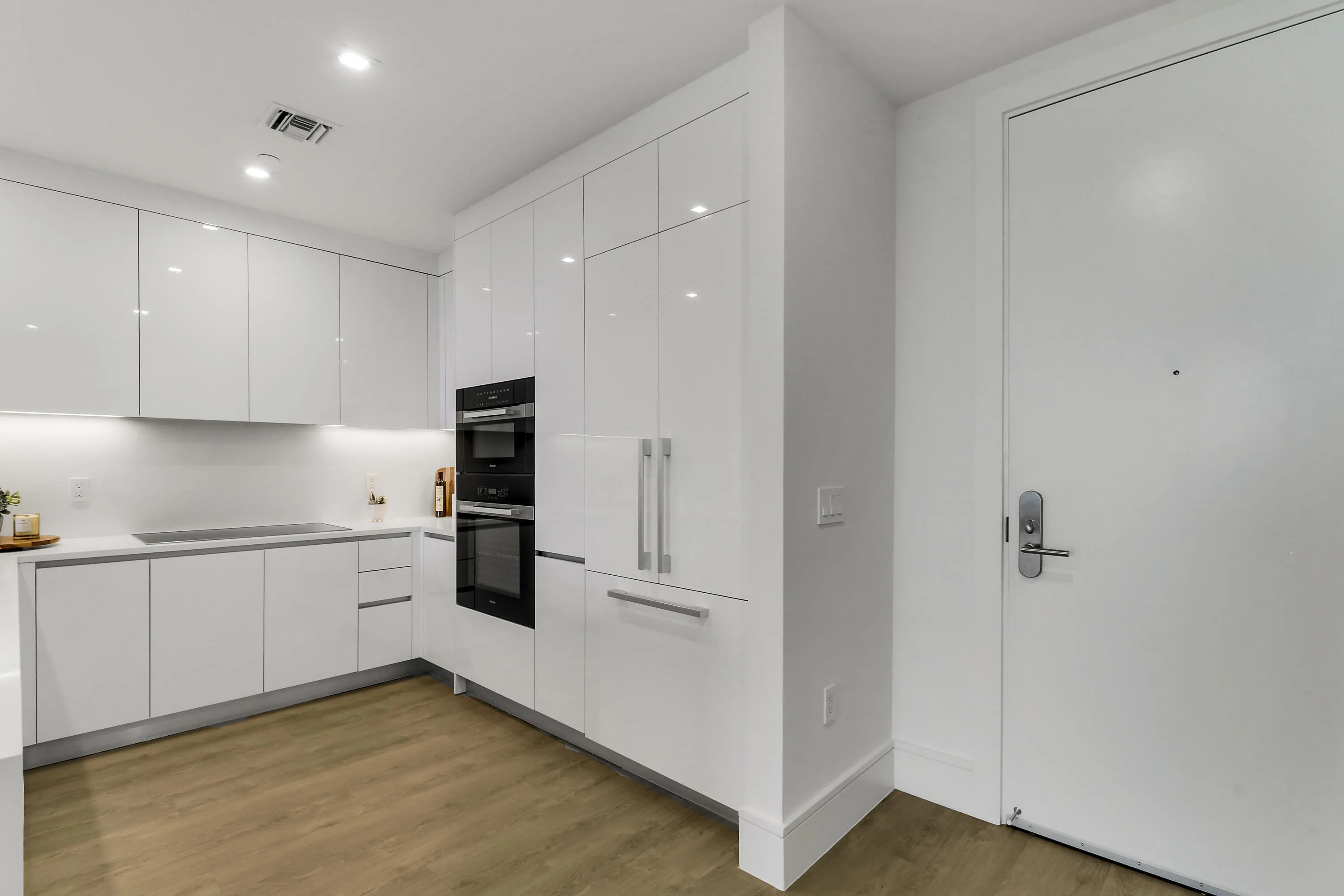 Kitchen showing refrigerator