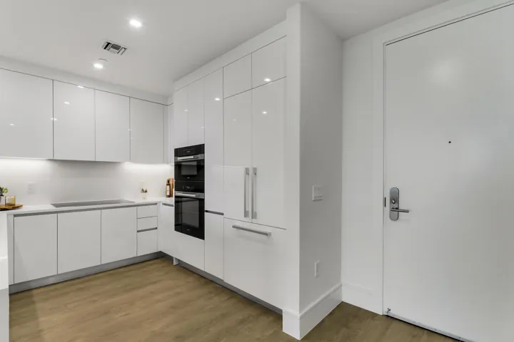 Kitchen showing refrigerator