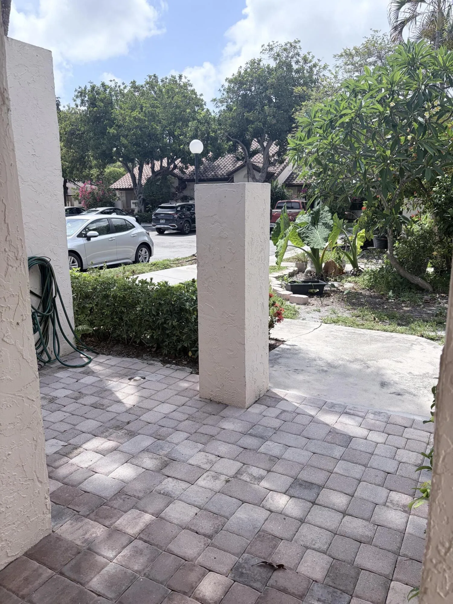 Front entry patio with storage room