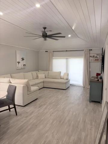 Vaulted ceiling with white beautiful shiplap finish