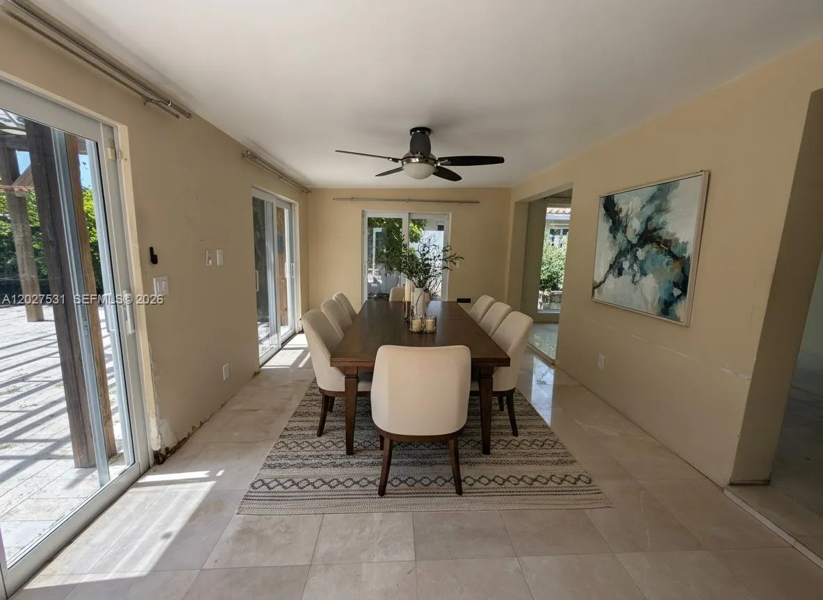 DINING AREA/FLORIDA ROOM STAGED
