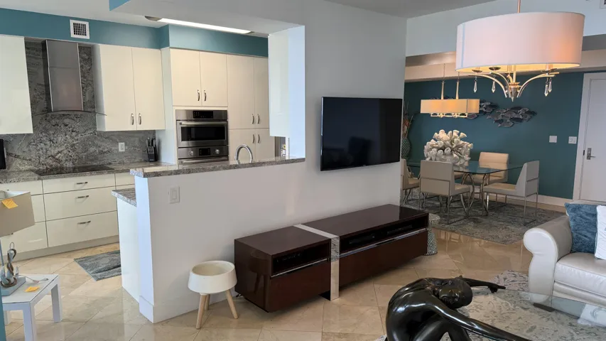 Kitchen with open wall to Living Room