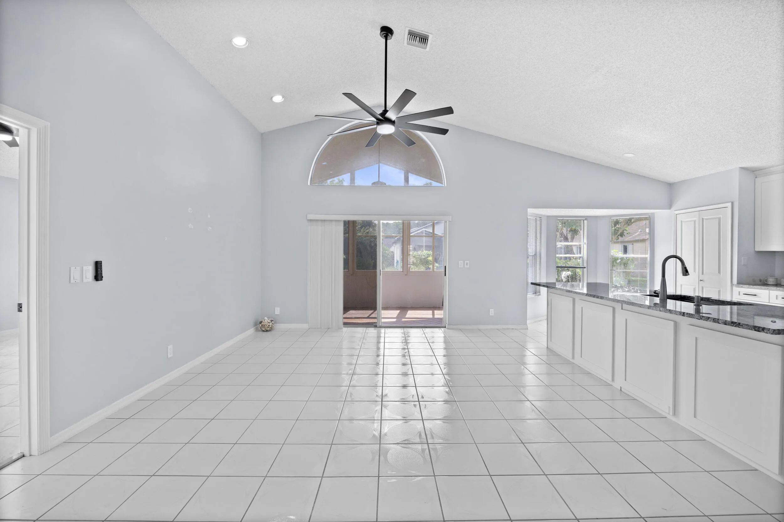 Door to primary suite, living room, kitchen.