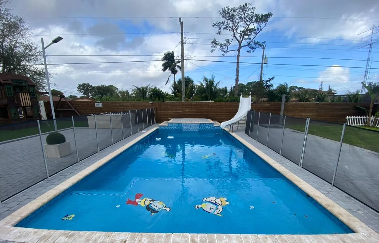 Redone pool with sundeck. Waterslide has been removed.