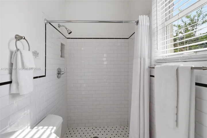Classicly styled bathroom in the apartment.