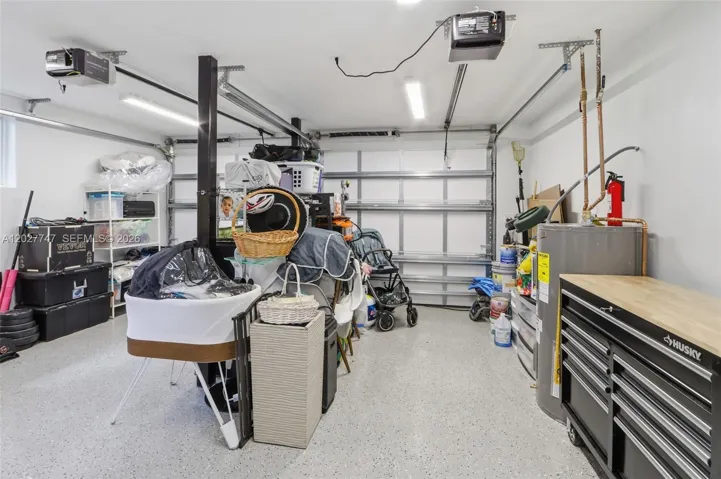 New split unit A/C for garage, water heater and insulated and impact garage door.