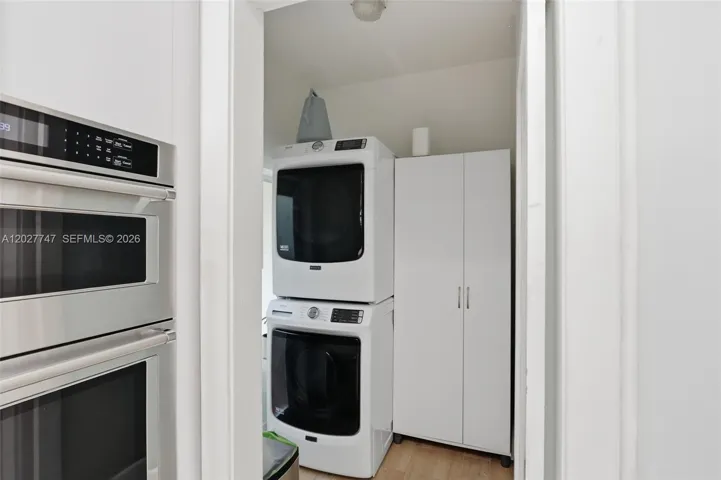 New washer and dryer in utility room