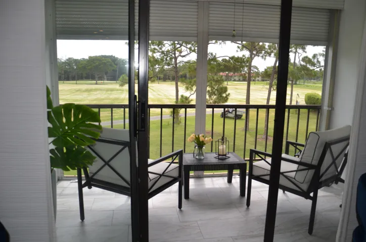 Spacious Screened Patio Overlooking Tranquil Golf Course