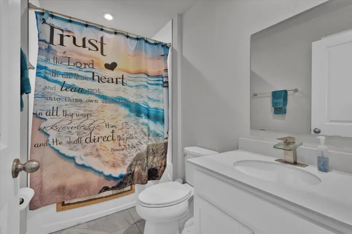 Full bathroom near upstairs bedrooms