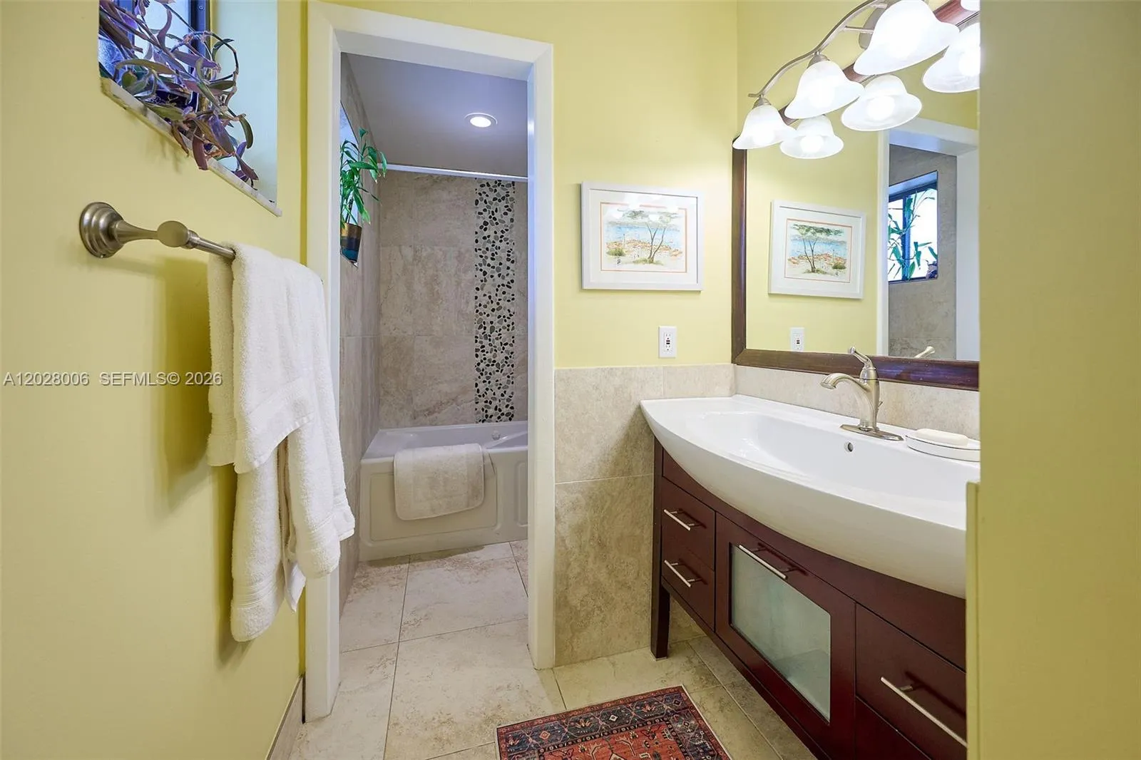 Second bathroom features a spa tub