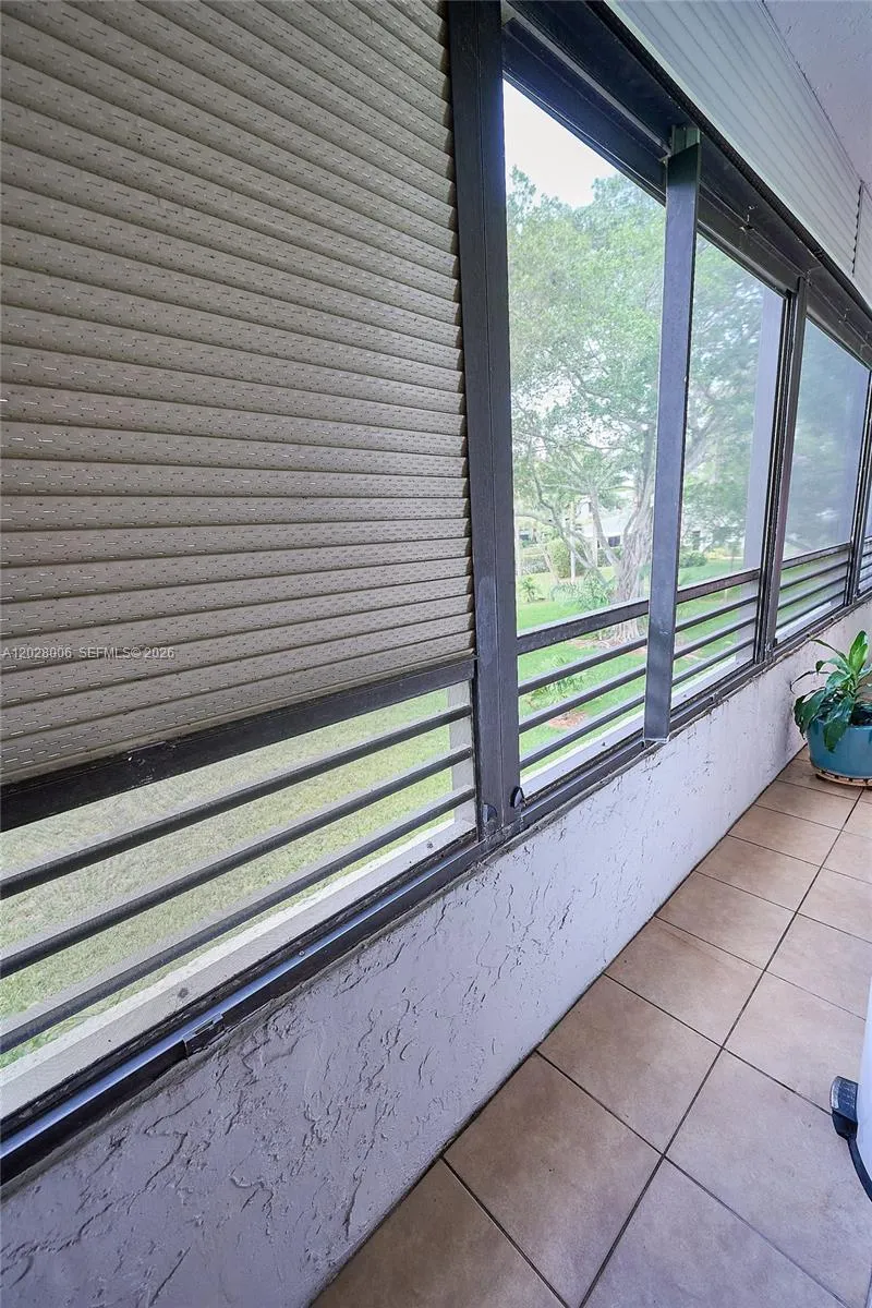 The lanai, which runs the width of the unit, features roll-down Soleil shutters to provide privacy and protection against inclement weather.