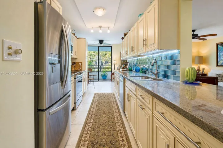 The galley kitchen opens to the lanai, as do all of the major rooms
