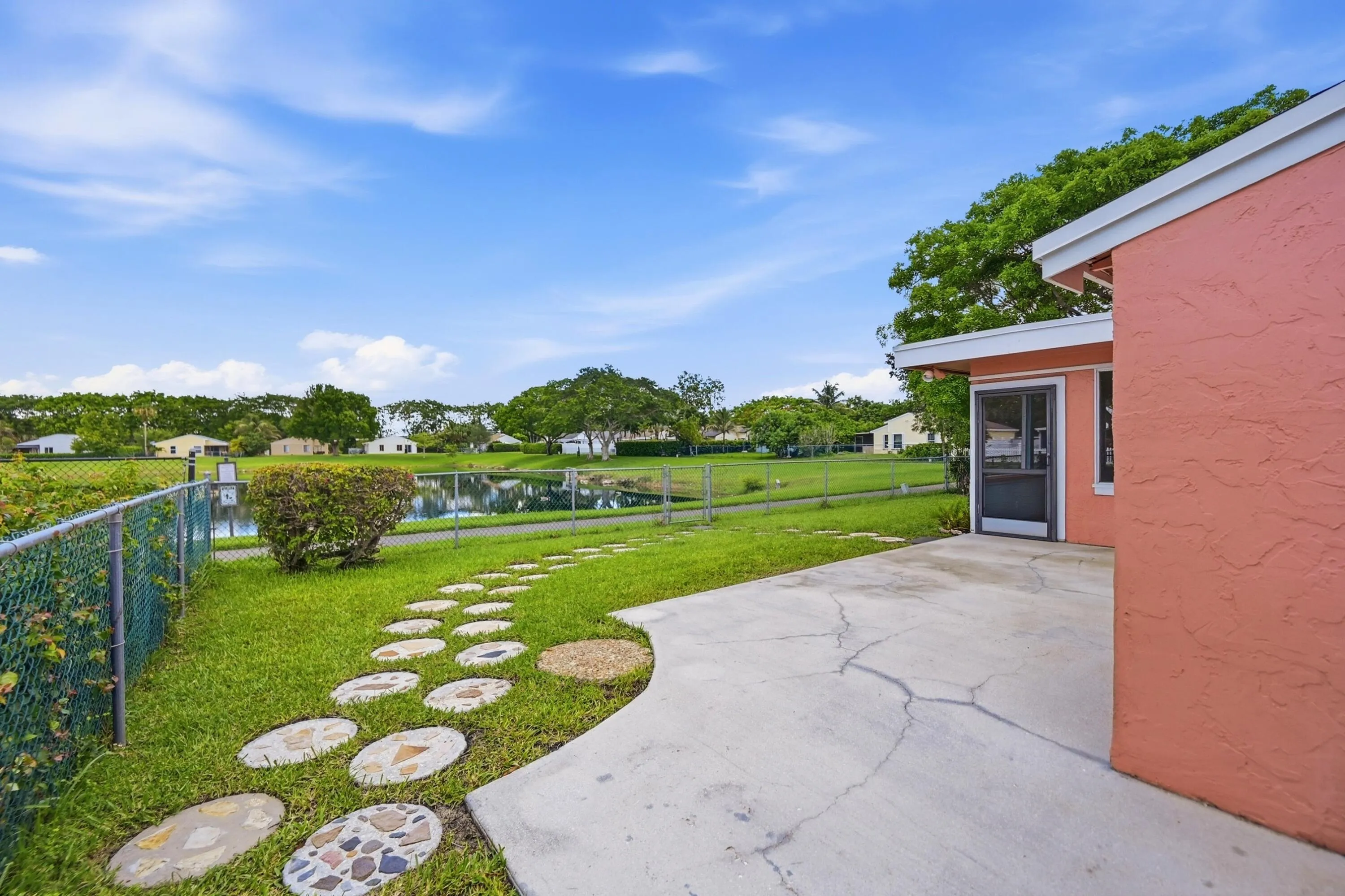 Backyard is fully fenced with custom landscaping and WHAT A VIEW