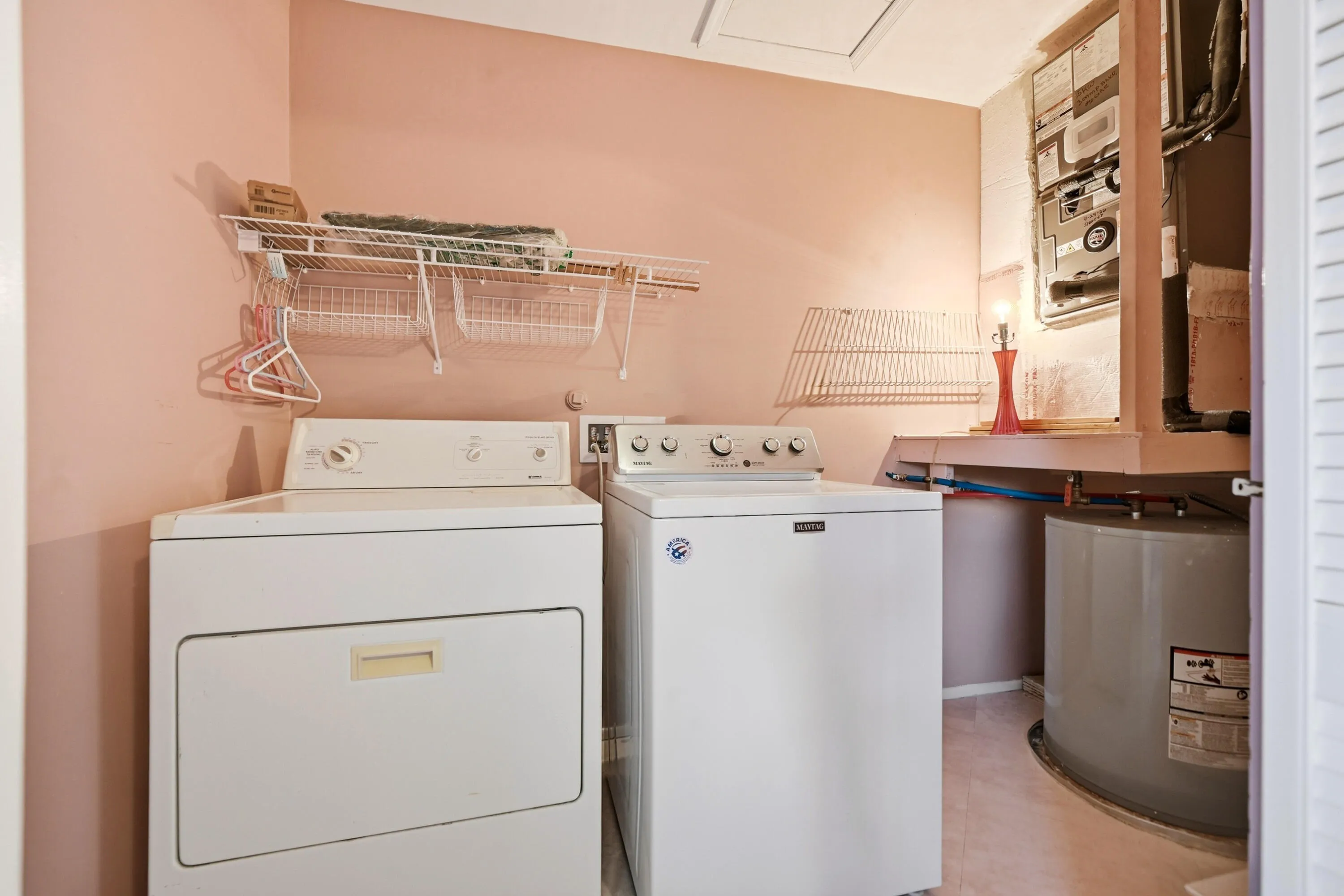Perfect location right off the kitchen area and hidden behind bi-fold doors