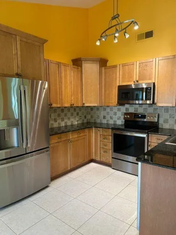 Lakefront, Updated, 3 bedroom/2 bath, with 2 Patios with serene water views