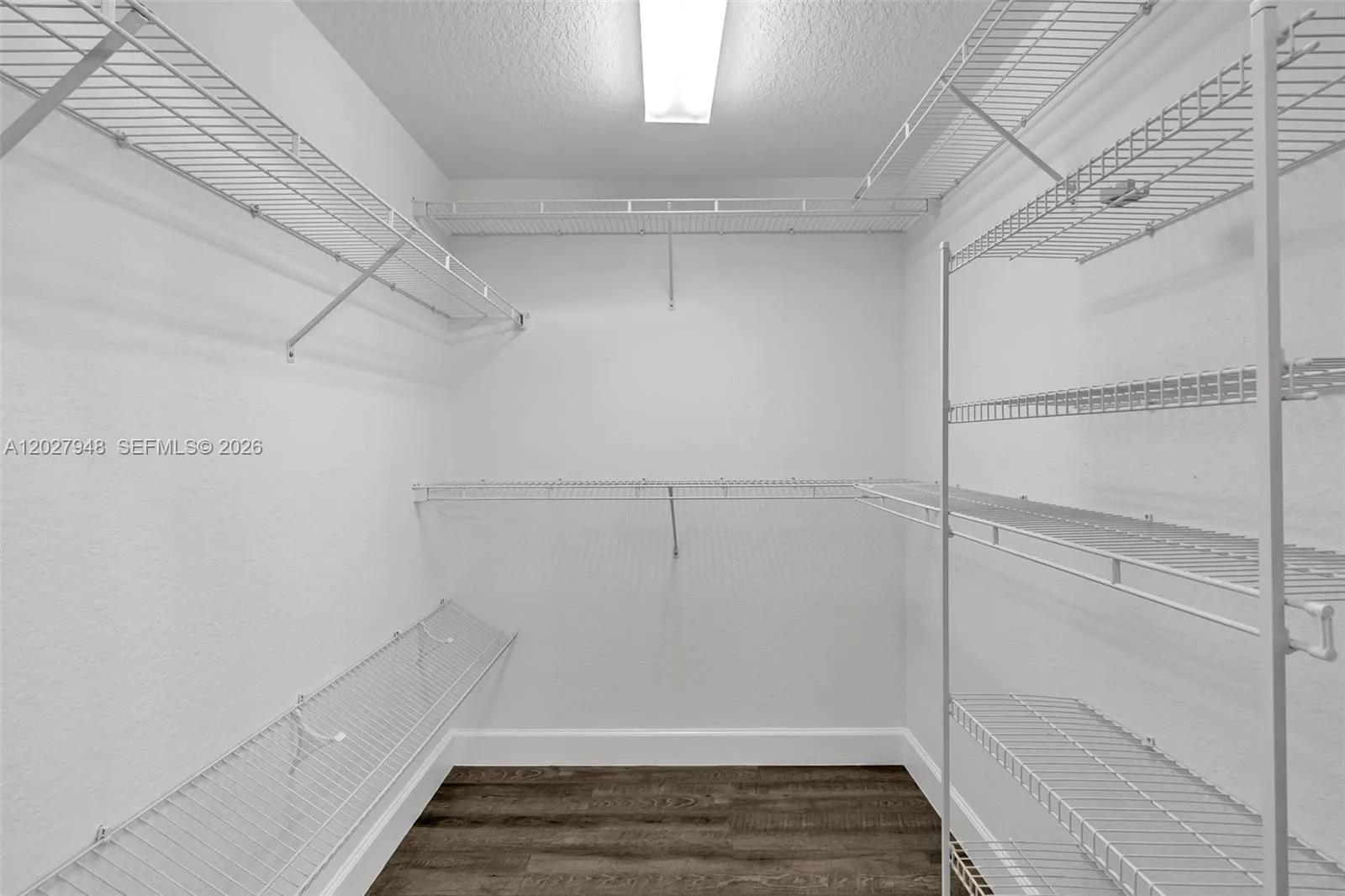 ONE OF TWO PRIMARY CLOSETS