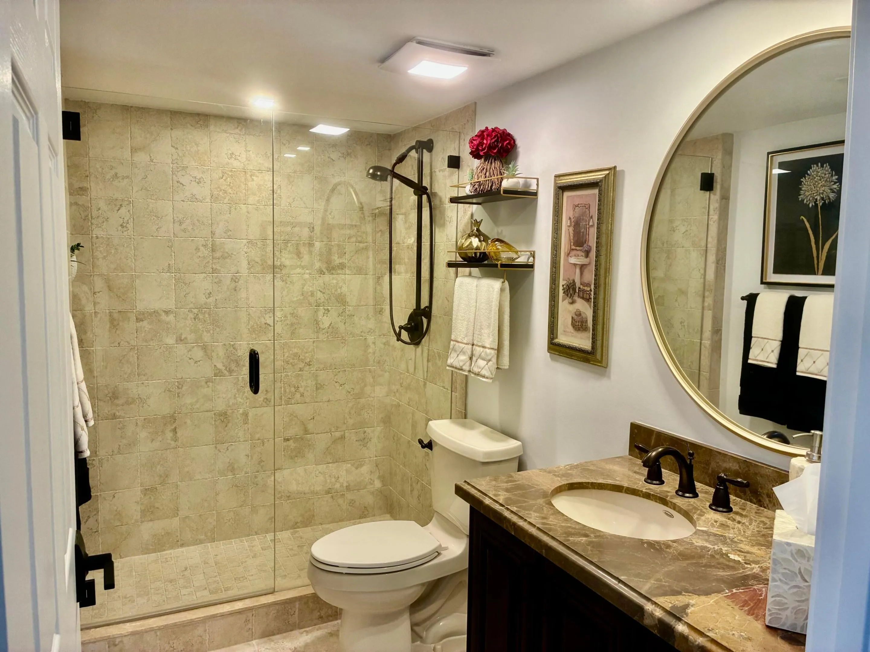 GUEST BATHROOM W/FRAMELESS GLASS DOORS