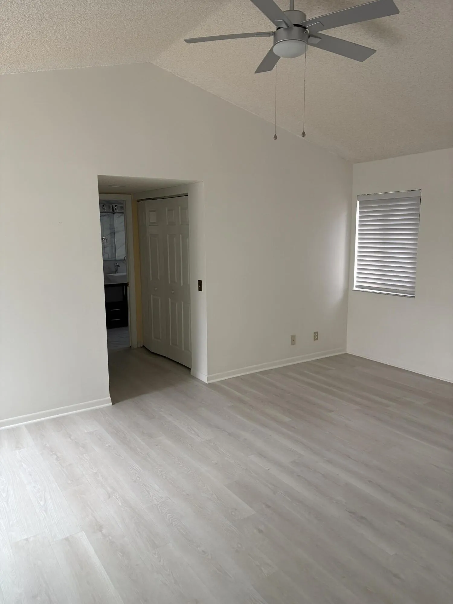 primary bed/bath with two walk in closets