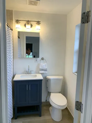 Clean and bright En-suite with large walk-in shower