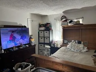 Primary bedroom with walk-in closet and ensuite bathroom