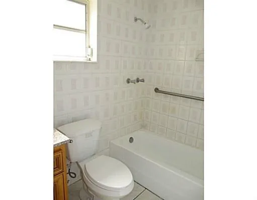 Primary bathroom with shower-tub combo