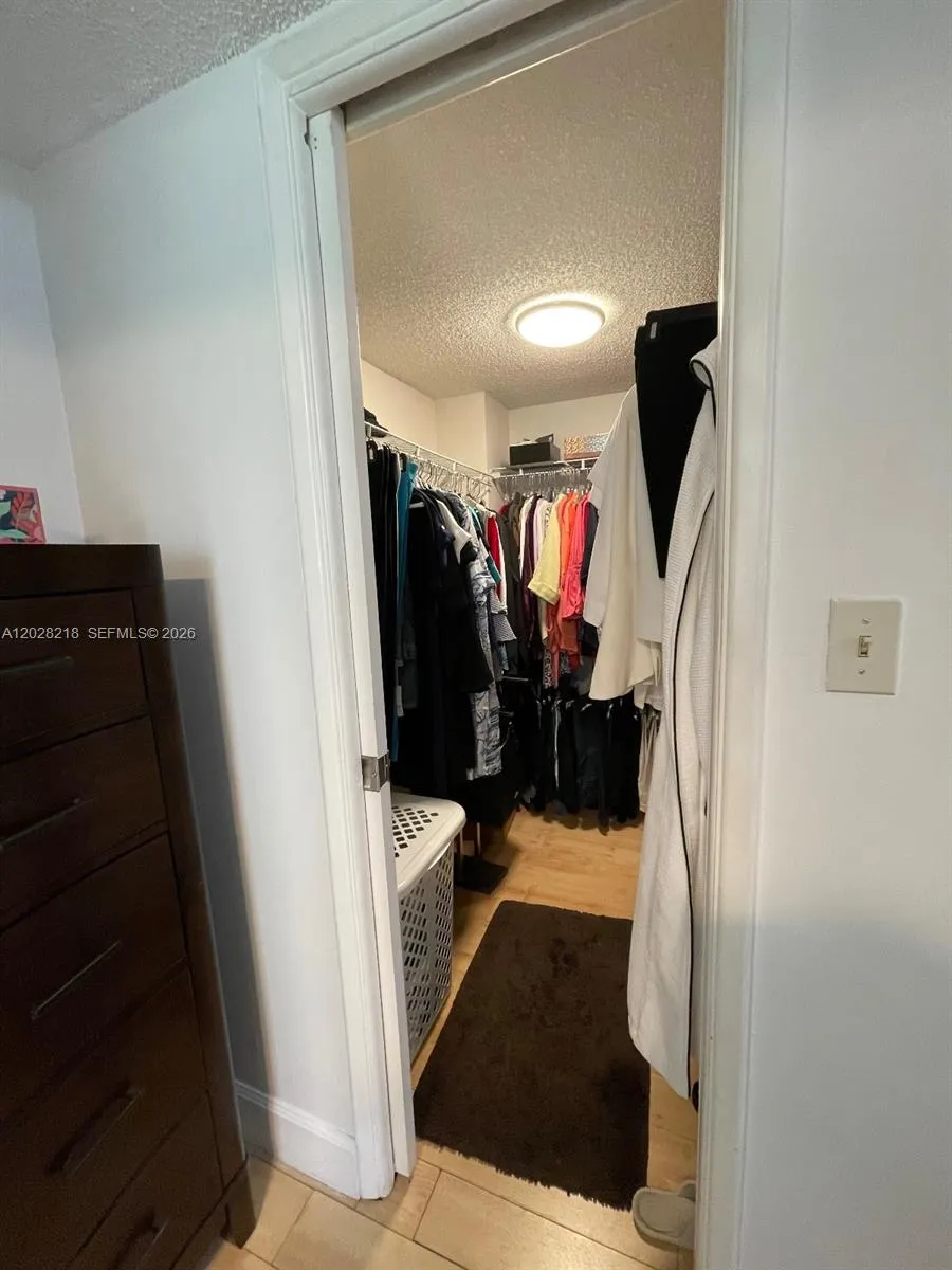 Walk in closet in main Bedroom