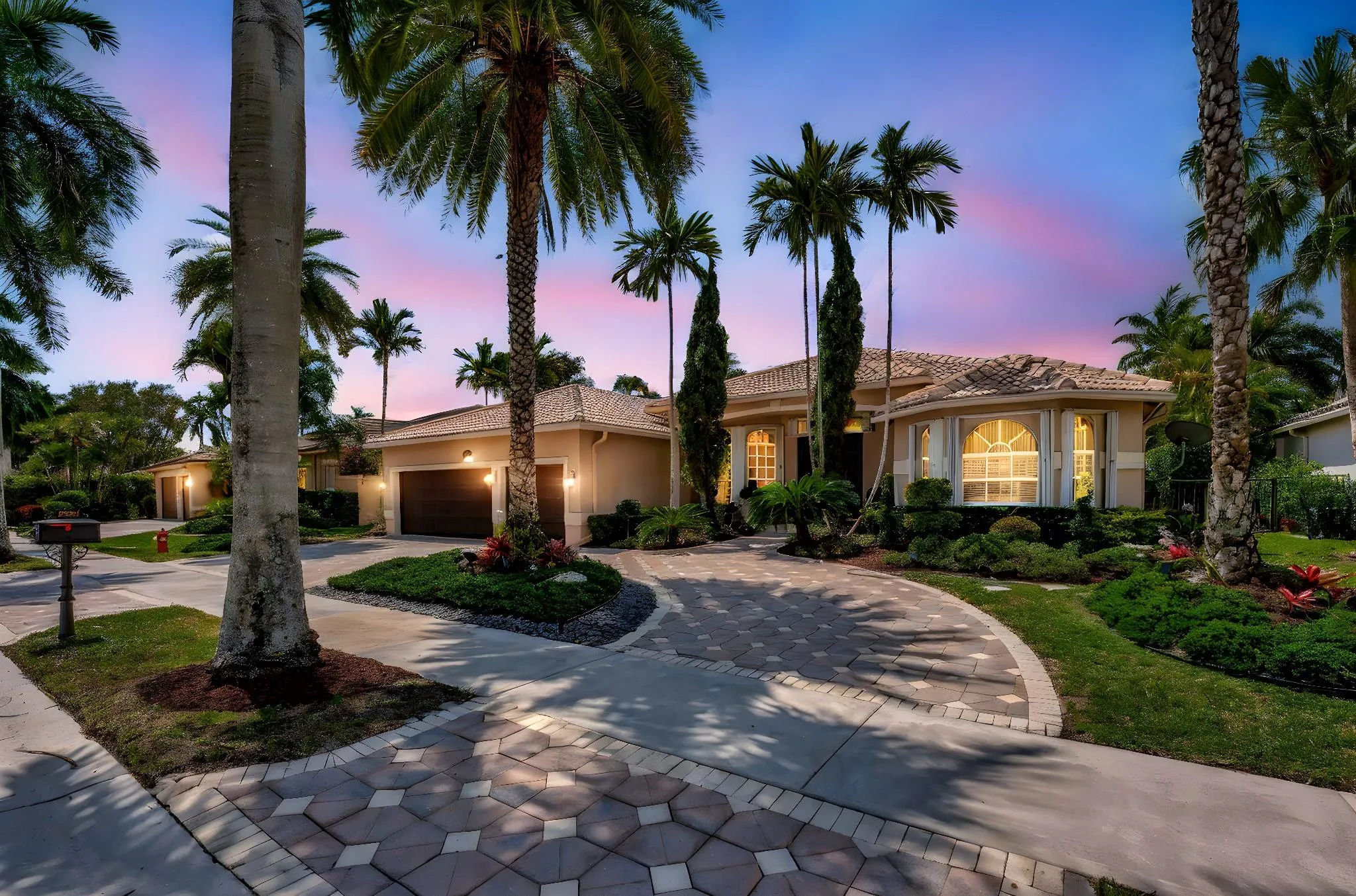 Stunning 4/3/3CG single story residence situated on a magnificent golf course lot in the heart of Weston Hills, with newer oversized lap pool and gorgeous landscaping!