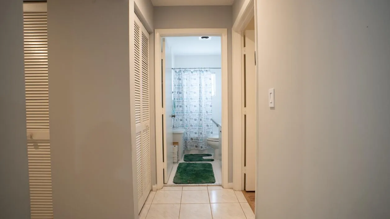 Primary hallway to bathroom