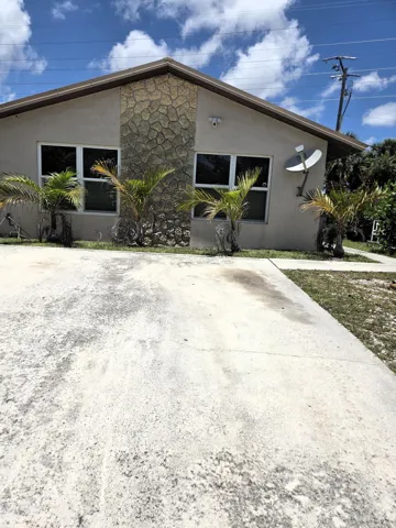 NEWER ROOF, IMPACT WINDOWS and DOOR.