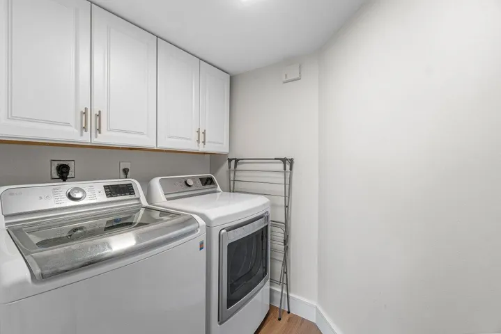 WALK IN LAUNDRY ROOM WITH STORAGE