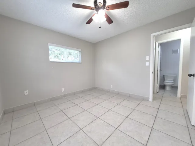 guest room view toward hall and bathroom